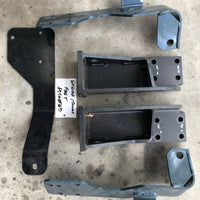 Various engine mount feet and brackets